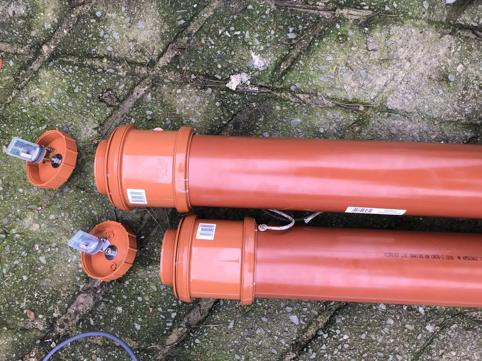 Early prototype sensor housings made from orange pipe