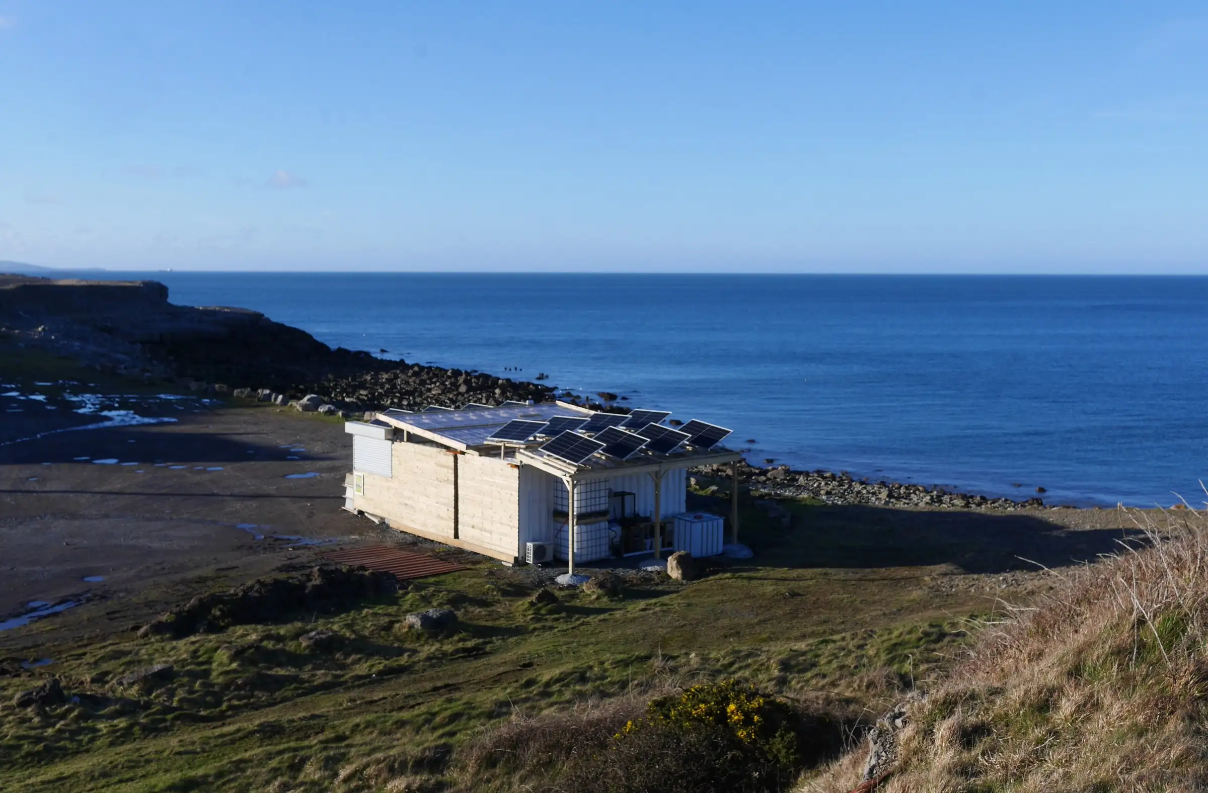 The PEBL seaweed hatchery building on the coast