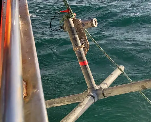 A SUBCAM2 being deployed on from the side of a vessel in Bideford Bay.