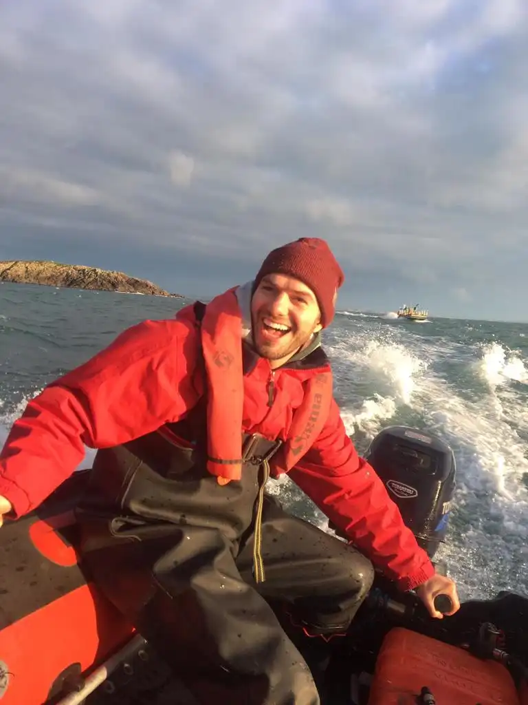 Christian Berger on a small boat at sea